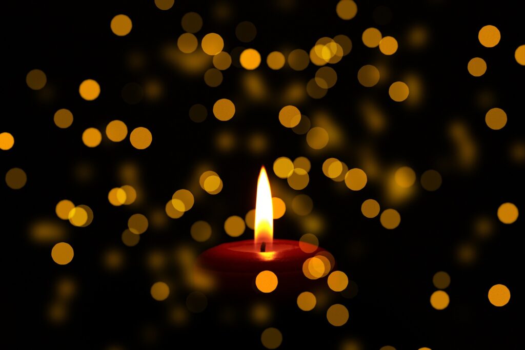 Holiday mental health can be difficult, as exemplified by this burning candle.