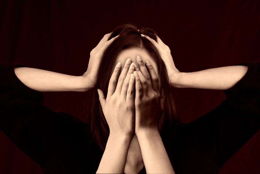 The mental health stigma can force people to hide their problems like this woman here.