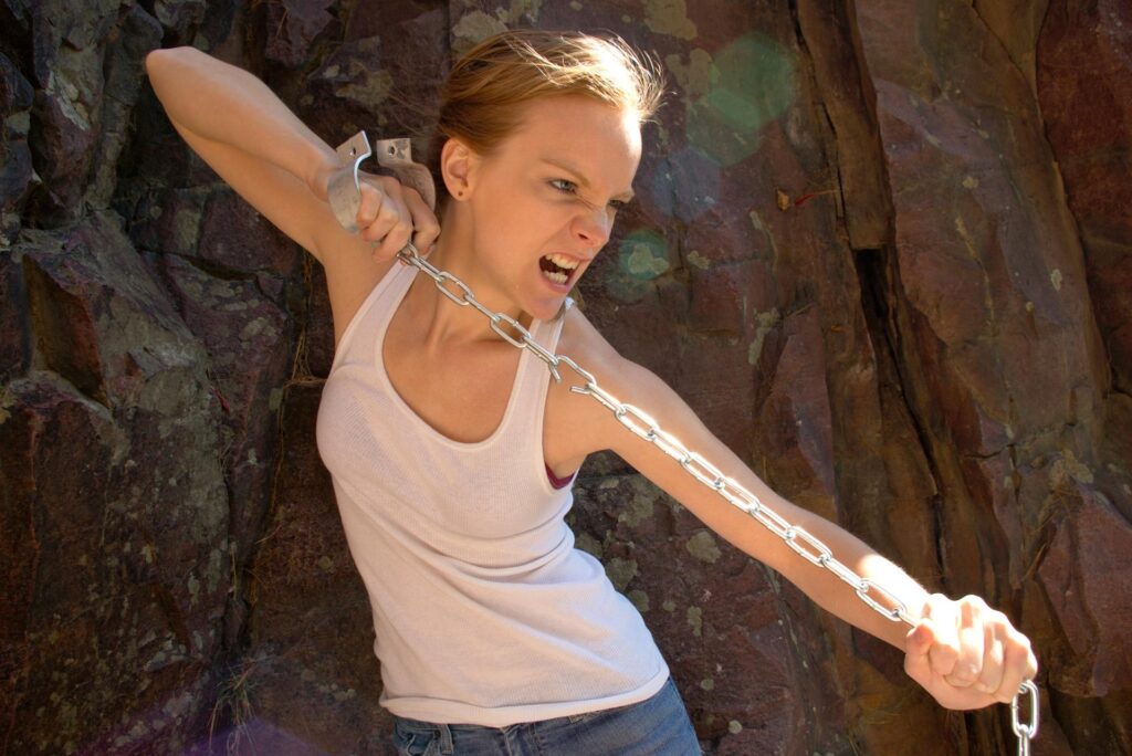 Mental health empowerment will help you break the chains that limit you, like this woman is doing.